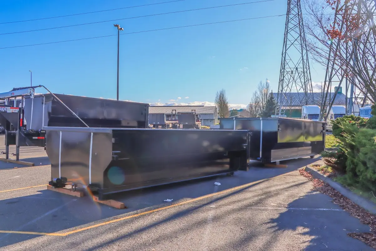 Roll-off dumpster ready for waste disposal at job site for 30 Yard Dumpster Rental in Olympia Heights